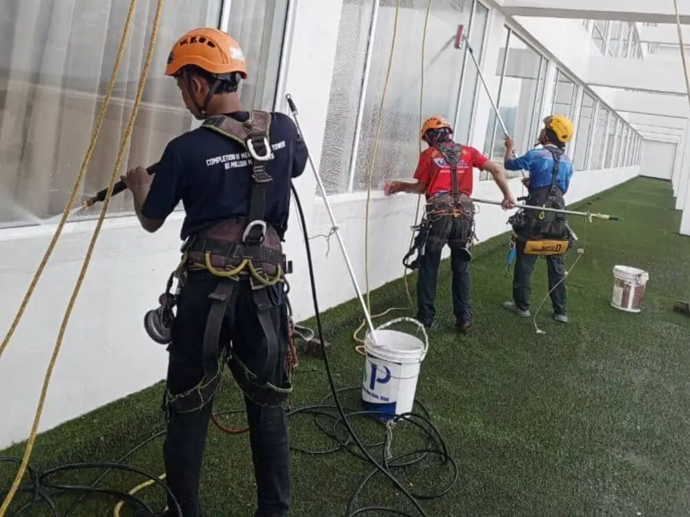 Rope access facade cleaning on a high-rise building
